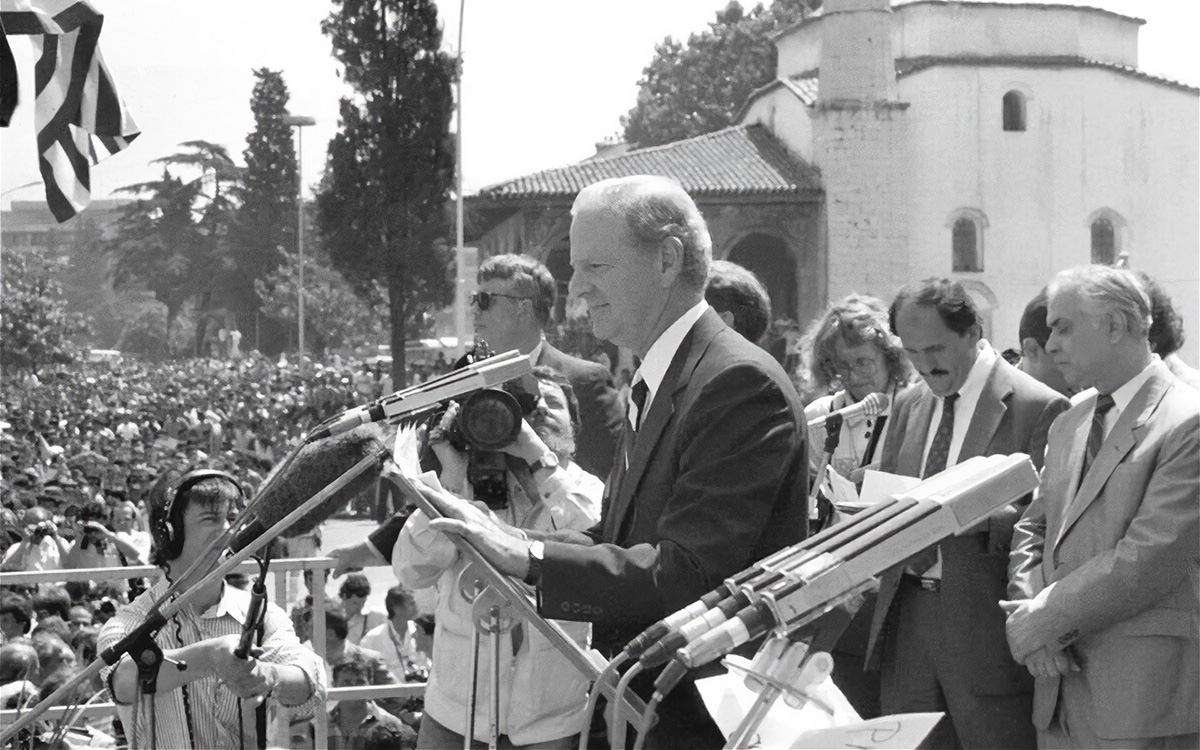 U.S. Secretary of State James Baker speaks to the Albanian people in 1991.