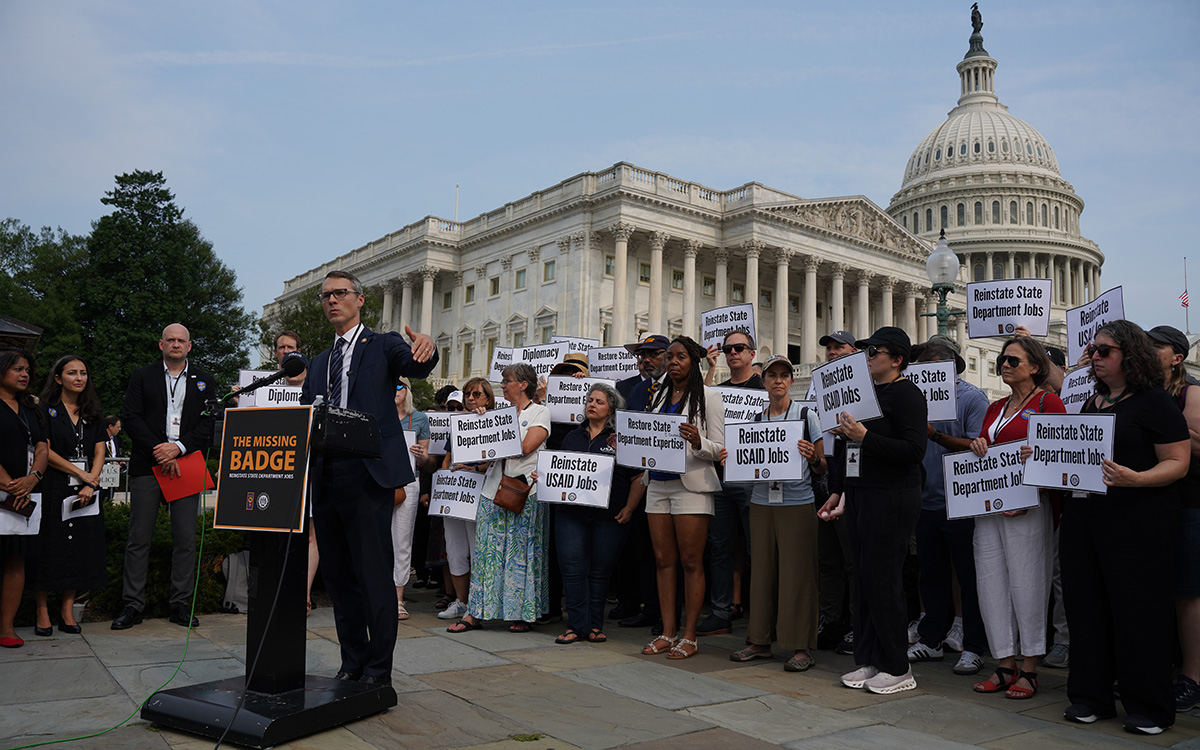 Demonstrators outside the U.S. Capitol call for State Department and USAID jobs to be reinstated.